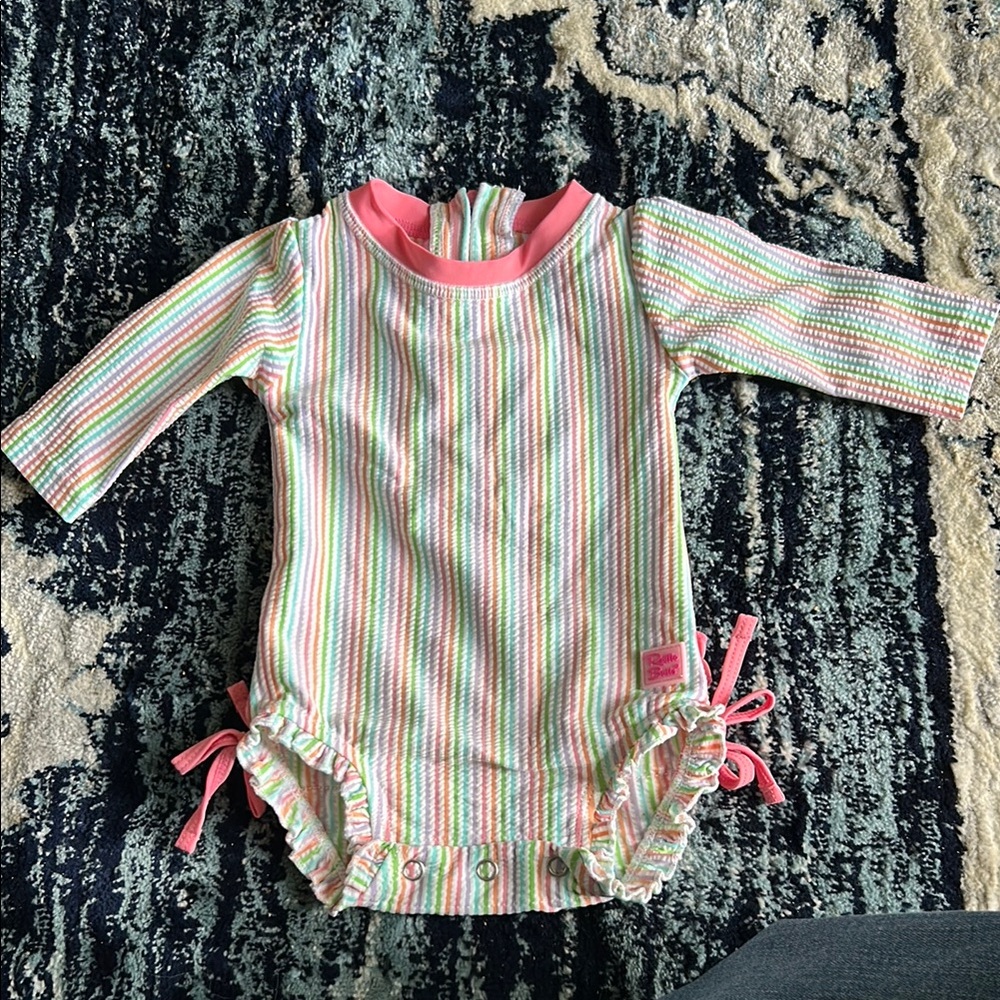 Striped RuffleButts baby swimsuit with Pink Trim